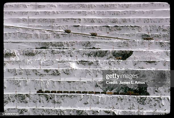 snowy terraces of bingham canyon copper mine - bingham canyon mine stock pictures, royalty-free photos & images