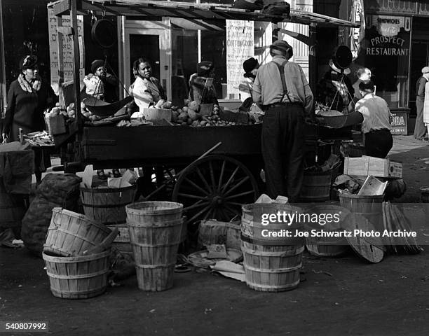 Man Sells Produce From Pushcart
