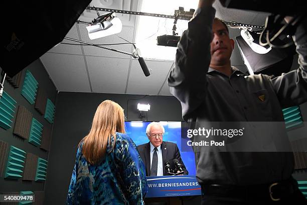 Jane O'Meara Sanders stands next to her husband, presidential candidate Bernie Sanders as he prepares to speak for a video to supporters at Polaris...