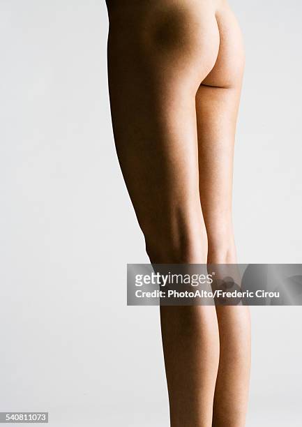 womans bare buttocks and legs - bare bottom women stock-fotos und bilder