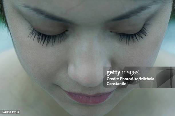 close-up of young womans face, eyes closed - wishful skin imagens e fotografias de stock