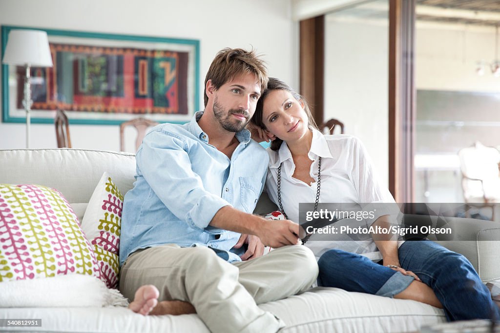Couple watching TV together