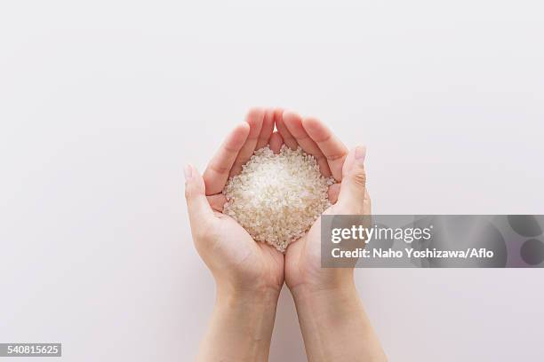Scooping Rice Photos and Premium High Res Pictures - Getty Images