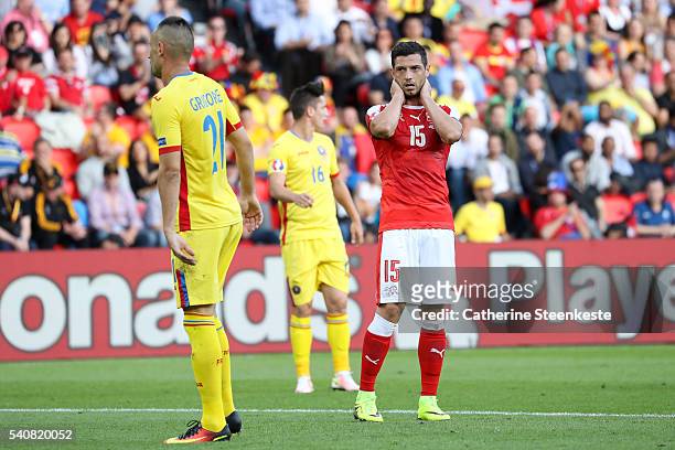Blerim Dzemaili of Switzerland reacts to a play during the UEFA EURO 2016 Group A match between Romania and Switzerland at Parc des Princes on June...