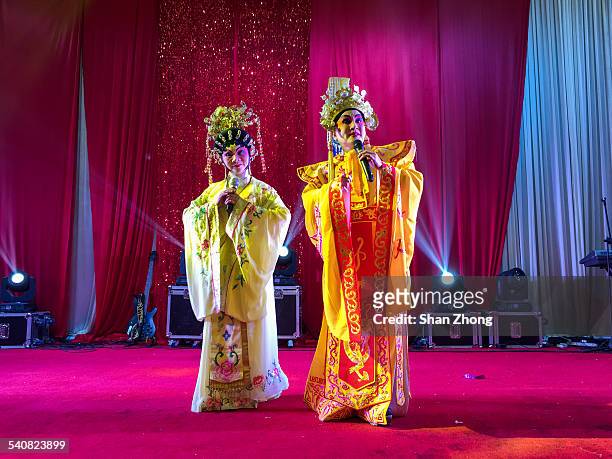 Two actors performing Cantonese opera during Chinese New Year celebration at Foshan, Guangdong province, China, February 18, 2015.