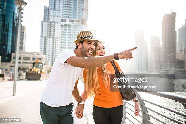 togetherness couple in vacations on dubai marina - uae - city walk dubai stockfoto's en -beelden