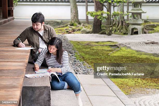 art students drawing and sketching in traditional japanese zen garden - connected mindfulness work stock pictures, royalty-free photos & images