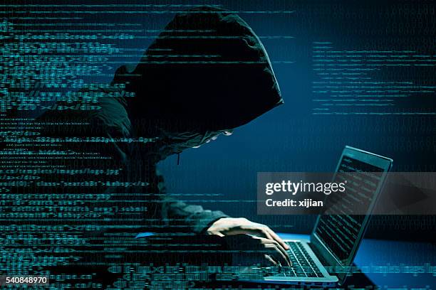 hacker attacking internet - anonymous hacker stockfoto's en -beelden