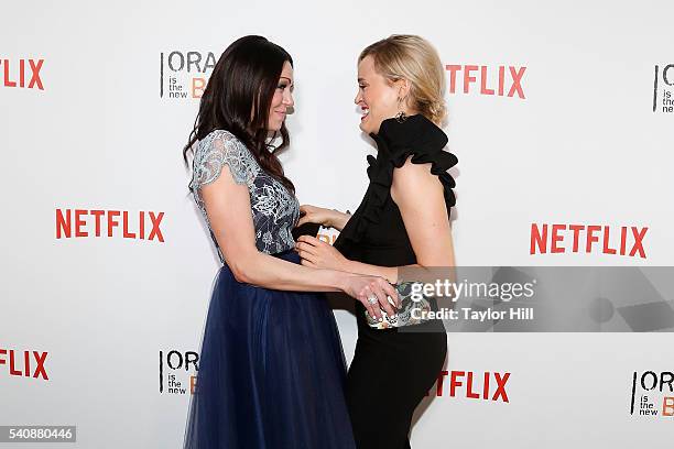 Actors Laura Prepon and Taylor Schilling attend the premiere of "Orange is the New Black" at SVA Theater on June 16, 2016 in New York City.