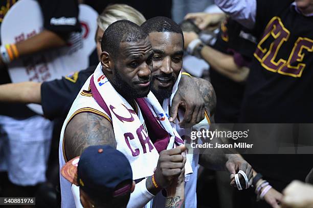 LeBron James of the Cleveland Cavaliers and J.R. Smith react after defeating the Golden State Warriors 115-101 in Game 6 of the 2016 NBA Finals at...