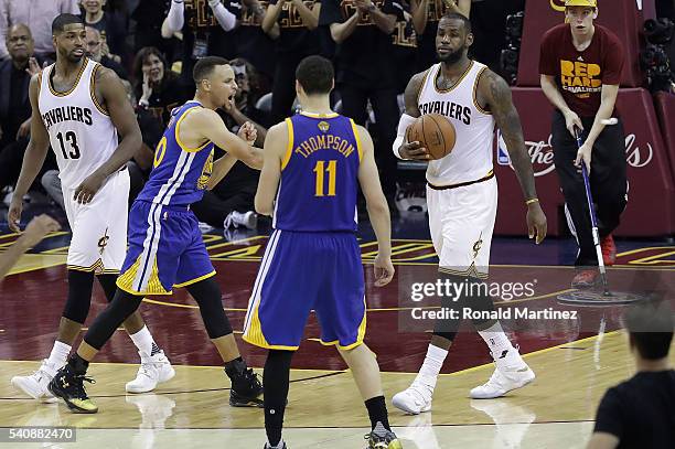 Stephen Curry of the Golden State Warriors throws his mouthguard into the stands during the fourth quarter against the Cleveland Cavaliers in Game 6...