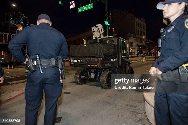 Large contingency of Oakland Police Department with specialized vehicles are seen in Downtown Oakland after Golden State Warriors lose Game 6 of the...