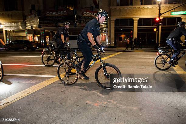 Large contingency of Oakland Police Department on bikes patrol Downtown Oakland after Golden State Warriors lose Game 6 of the 2016 NBA finals...