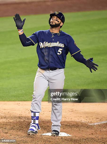 Jonathan Villar of the Milwaukee Brewers celebrates his two run homerun to take a 8-6 lead over the Los Angeles Dodgers during the ninth inning at...