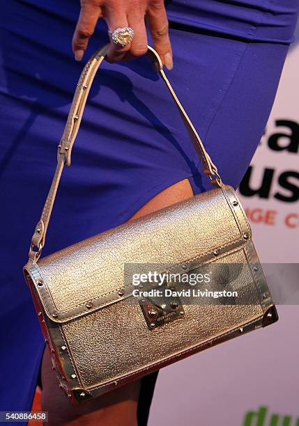 Personality Alexis Bellino, purse detail, attends the premiere party for Bravo's "The Real Housewives of Orange County" 10 Year Celebration at...