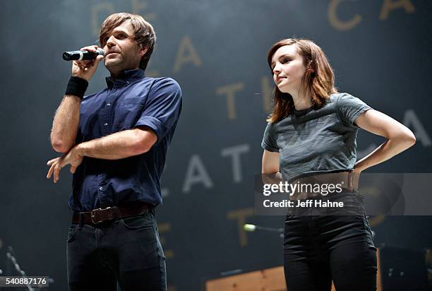 Ben Gibbard of Death Cab for Cutie and Lauren Mayberry of Chvrches talk to the crowd about North Carolina's HB2 at Charlotte Metro Credit Union...