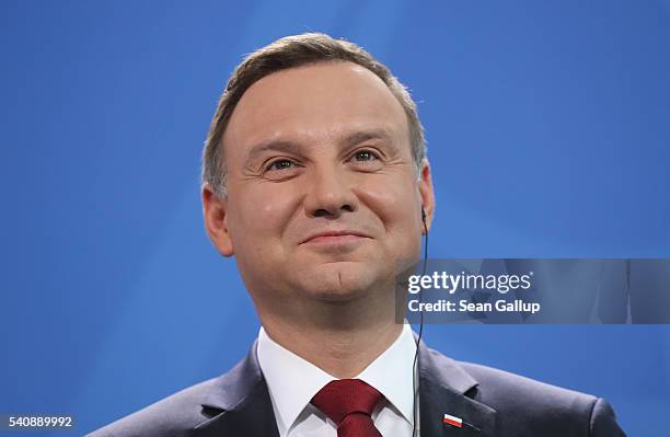 Polish President Andrzej Duda and German Chancellor Angela Merkel give statements to the media prior to talks at the Chancellery on June 17, 2016 in...