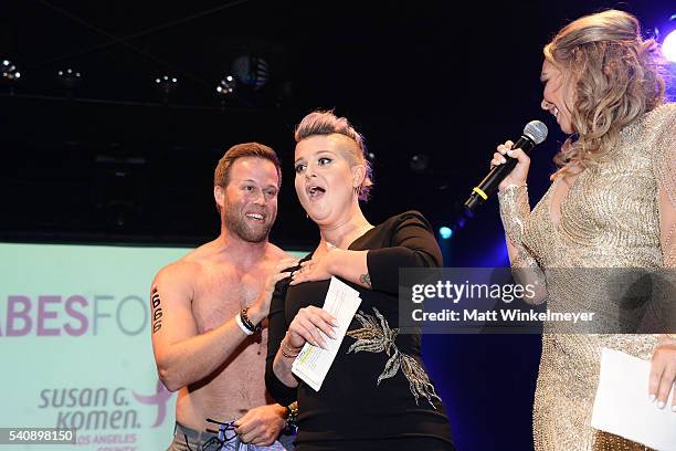 Personality Kelly Osbourne and dancer Kym Johnson attend the Babes for Boobs Bachelor Auction benefitting the Los Angeles County Affiliate of Susan...