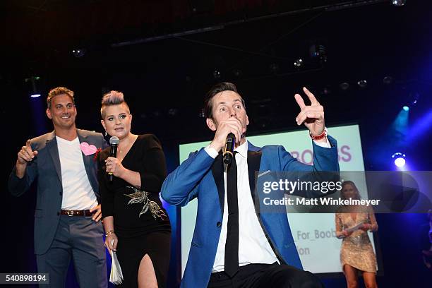 Personality Kelly Osbourne and dancer Kym Johnson attend the Babes for Boobs Bachelor Auction benefitting the Los Angeles County Affiliate of Susan...