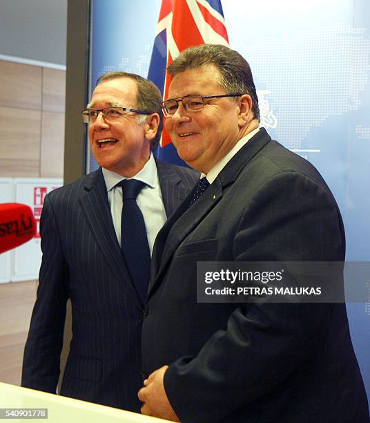 New Zealand's Foreign Minister Murray McCully and his Lithuanian counterpart Linas Linkevicius react during a joint press conference in Vilnius, on...