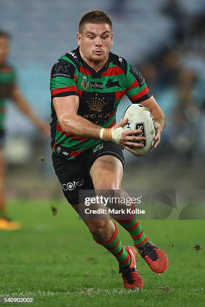 Paul Carter of the Rabbitohs runs the ball during the round 15 NRL match between the South Sydney Rabbitohs and the Parramatta Eels at ANZ Stadium on...