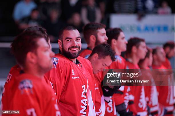 Team Canada line up for the national anthem before the match between Team USA and Team Canada at Rod Laver Arena on June 17, 2016 in Melbourne,...