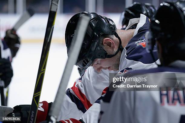 John Scott of USA catches his breath during the match between Team USA and Team Canada at Rod Laver Arena on June 17, 2016 in Melbourne, Australia.