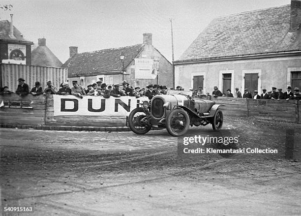 The first Le Mans 24 Hours; Le Mans, May 26-27, 1923. The Chenard & Walker of André Lagache and René Leonard at the Pontlieu turn. They won overall./