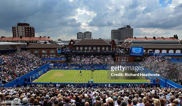 Kyle Edmund and Andy Murray contest the first quarter final between two British players in the open era during day five of The Aegon Championships at...