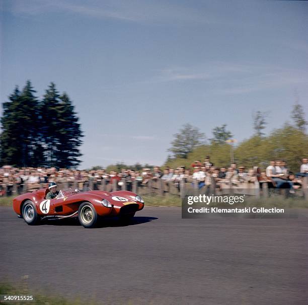 The Nürburgring 1000km. Race; Nürburgring, June 1, 1958. Mike Hawthorn with the Ferrari 250TR which he shared with Peter Collins into second place.