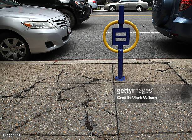 Bike rack in the shape of the Human Rights Campaign logo sits in front of the Human Rights Campaign building, June 16, 2016 in Washington, DC. Images...
