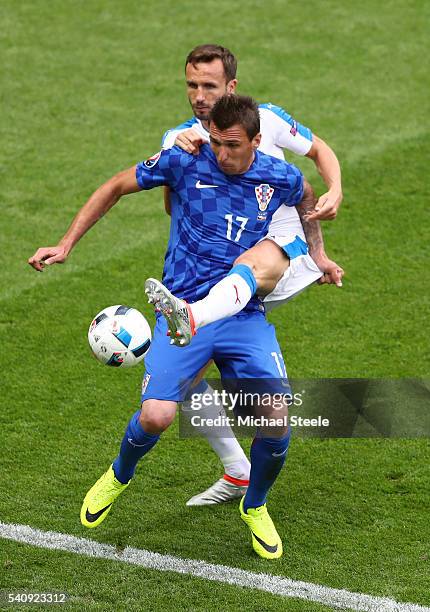 Tomas Sivok of Czech Republic puts pressue on Mario Mandzukic of Croatia during the UEFA EURO 2016 Group D match between Czech Republic and Croatia...