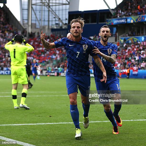 Ivan Rakitic of Croatia celebrates scoring his side's second goal with team-mate Marceloe Brozovic during the UEFA Euro 2016 Group D match between...