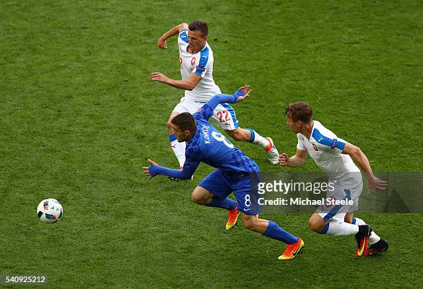 Mateo Kovacic of Croatia is chased down by Josef Sural of Czech Republic and Vladimir Darida of Czech Republic during the UEFA EURO 2016 Group D...