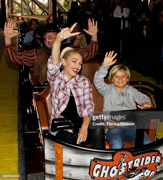 Gwen Stefani and her son Zuma Rossdale ride the GhostRider roller coaster at Knott's Berry Farm on June 11, 2016 in Buena Park, California.