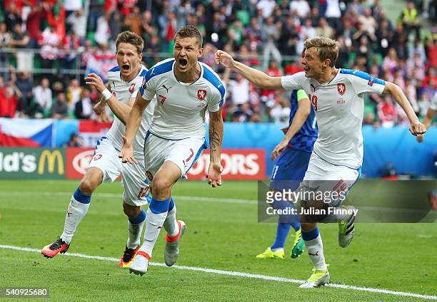 Tomas Necid of Czech Republic celebrates with Milan Skoda and Ladislav Krejci after he scores from the penalty spot to make the score 2-2 during the...