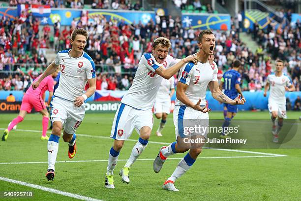 Tomas Necid of Czech Republic celebrates with Milan Skoda and Ladislav Krejci after he scores from the penalty spot to make the score 2-2 during the...