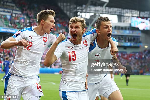 Tomas Necid of Czech Republic celebrates with Milan Skoda and Ladislav Krejci after he scores from the penalty spot to make the score 2-2 during the...