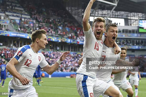 Czech Republic's forward Tomas Necid celebrates with Croatia's midfielder Milan Badelj and Czech Republic's forward Milan Skoda after scoring during...
