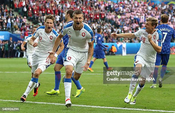 Tomas Necid of Czech Republic celebrates scoring a penalty to make the score 2-2 during the UEFA EURO 2016 Group D match between Czech Republic and...