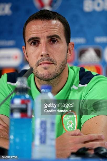 In this handout image provided by UEFA, Republic of Ireland's player John O'Shea looks on during a press conference at Matmut Atlantique Stadium on...