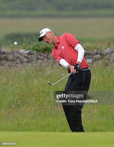 Adrian Meronk of Poland chips on to the 6th green during The Amateur Championship 2016 - Day Five at Royal Porthcawl Golf Club on June 17, 2016 in...