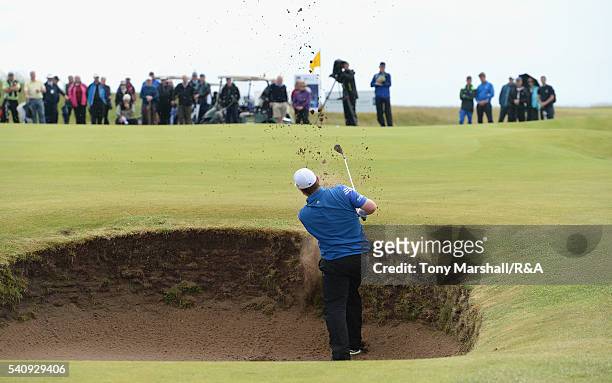 Robert MacIntyre of Glencruitten plays out of a bunker onto the 8th green during The Amateur Championship 2016 - Day Five at Royal Porthcawl Golf...