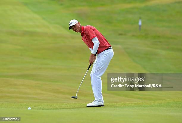 Adrian Meronk of Poland putts on the 1st green during The Amateur Championship 2016 - Day Five at Royal Porthcawl Golf Club on June 17, 2016 in...