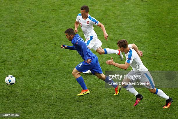 Mateo Kovacic of Croatia is chased down by Josef Sural and Pavel Kaderabek of Czech Republic during the UEFA EURO 2016 Group D match between Czech...
