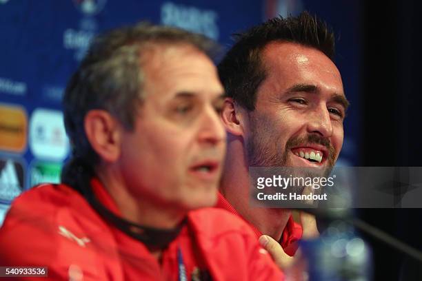 In this handout image provided by UEFA head coach Marcel Koller and Christian Fuchs of Austria attend a press conference at Parc des Princes on June...