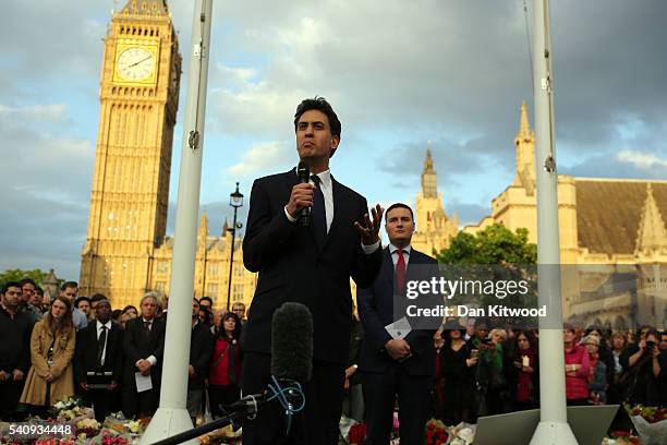 Former Labour Leader Ed Miliband speaks as Labour MP for Ilford North Wes Streeting looks on as they attend a vigil in memory of Labour MP Jo Cox on...