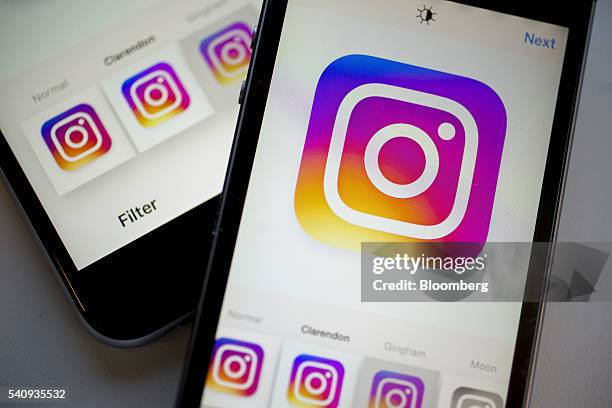 Facebook Inc.'s Instagram logo is displayed on the Instagram application on an Apple Inc. IPhone in this arranged photograph taken in Washington,...