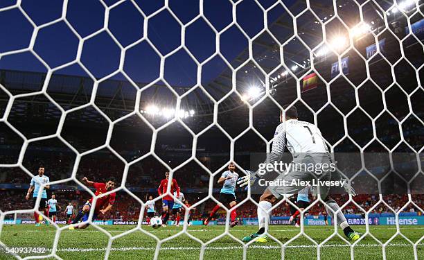 Nolito of Spain scores his sides second goal past Volkan Babacan of Turkey during the UEFA EURO 2016 Group D match between Spain and Turkey at...