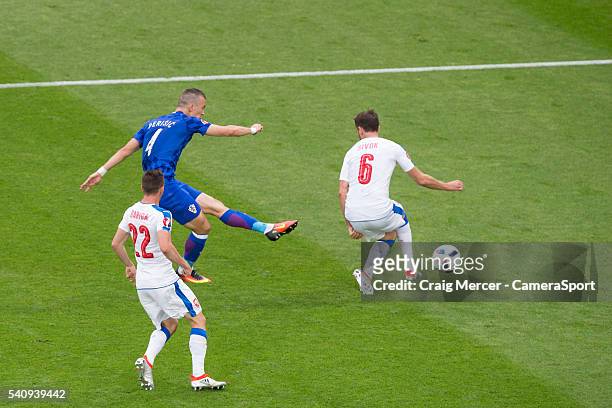 Croatia's Ivan Perisic scores the opening goal despite the attentions of Czech Republic's Tomas Sivok during the UEFA Euro 2016 Group D match between...